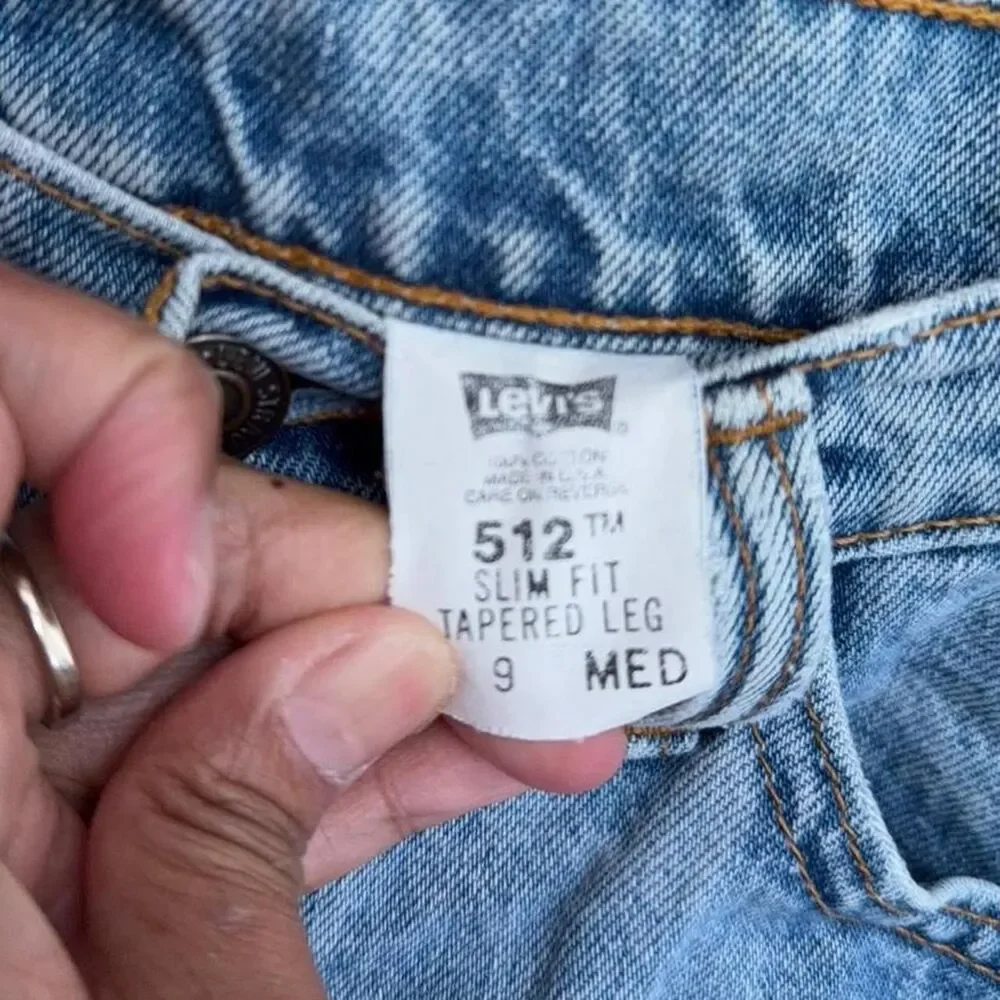 Light blue vintage Levi's 512 slim fit tapered leg jeans size 9M